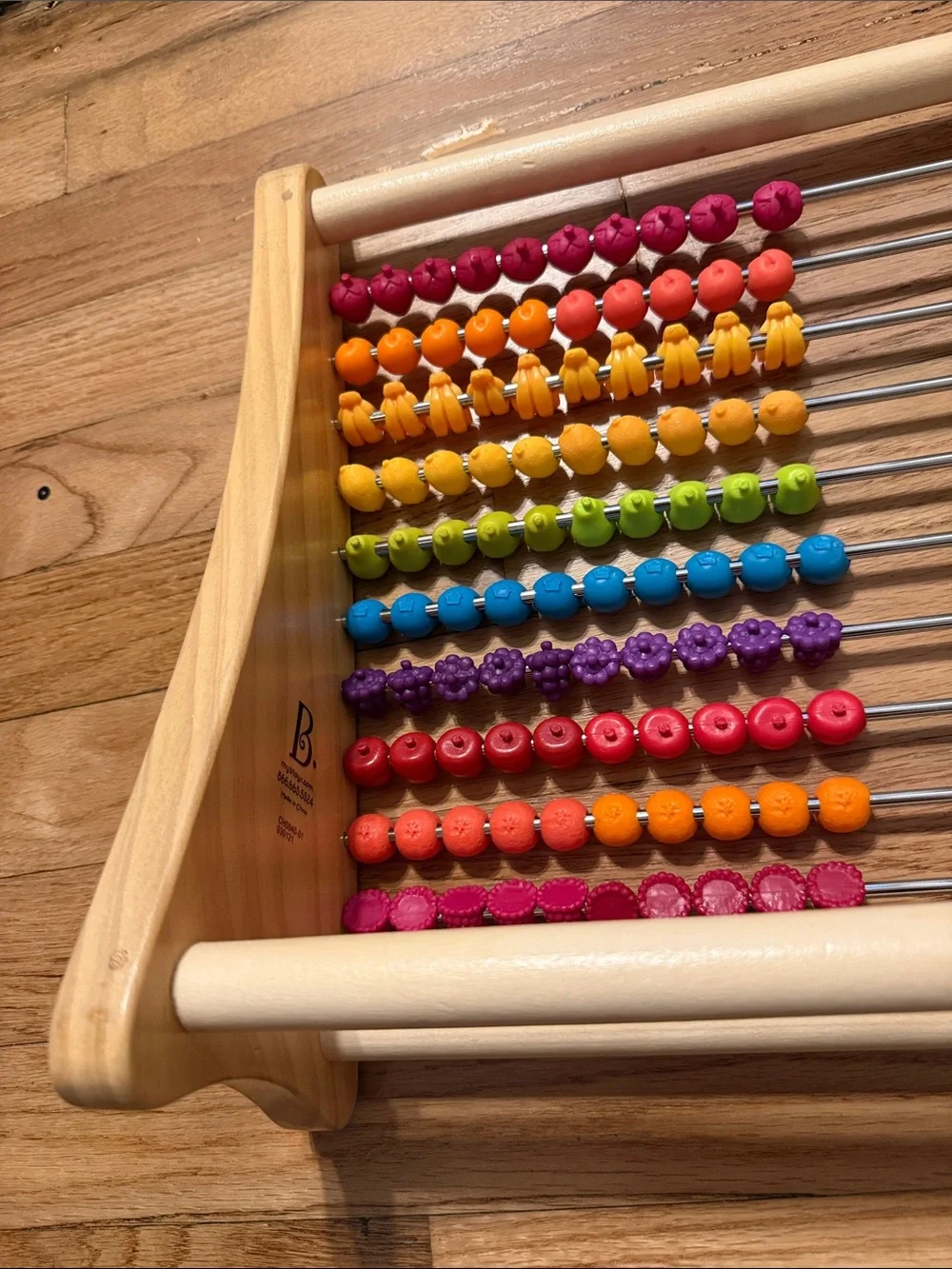 B. Toys Wooden fruit Counting Abacus - Multicolor like new